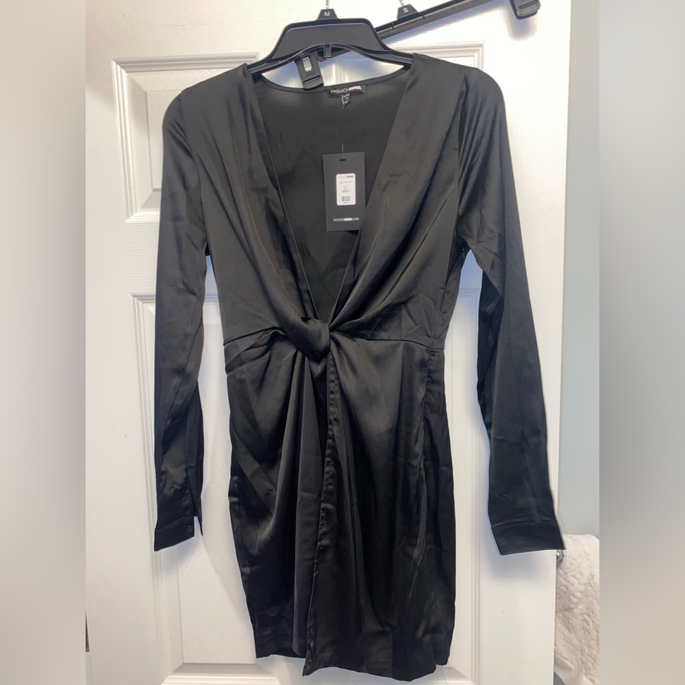 Black long sleeve low cut twist dress
